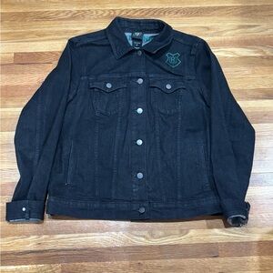 Black denim jacket with embroidered Hogwarts crest on back